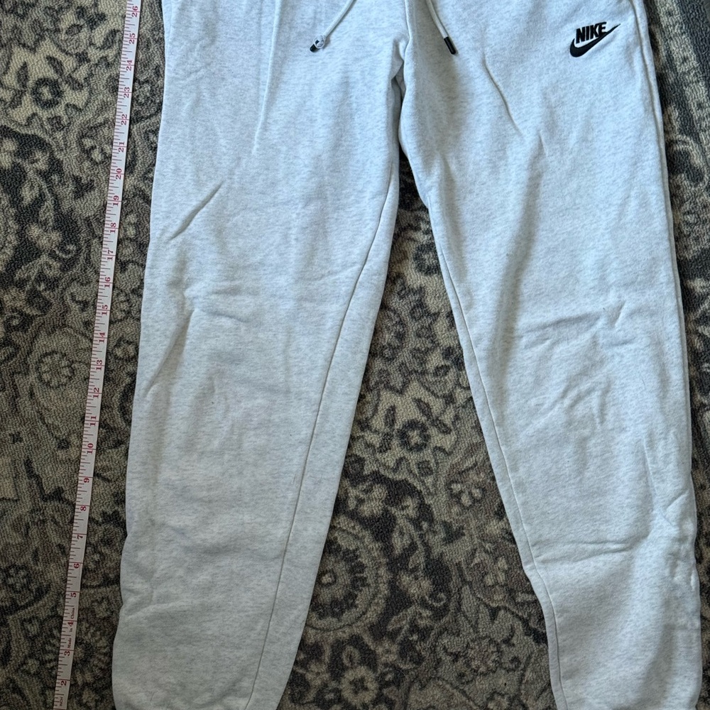 Nike Light Gray Track Pants with Elastic Waistband and Tapered Legs